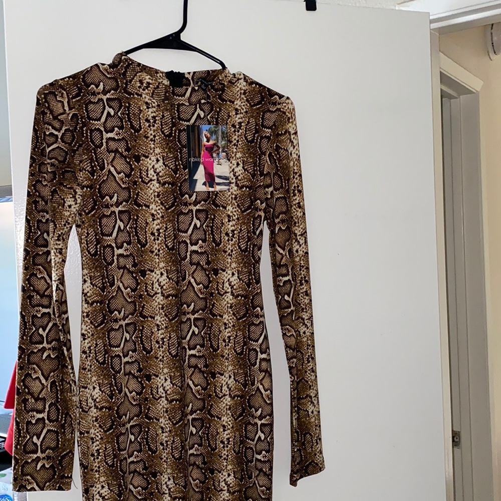 Brand new cheetah print naked wardrobe dress.